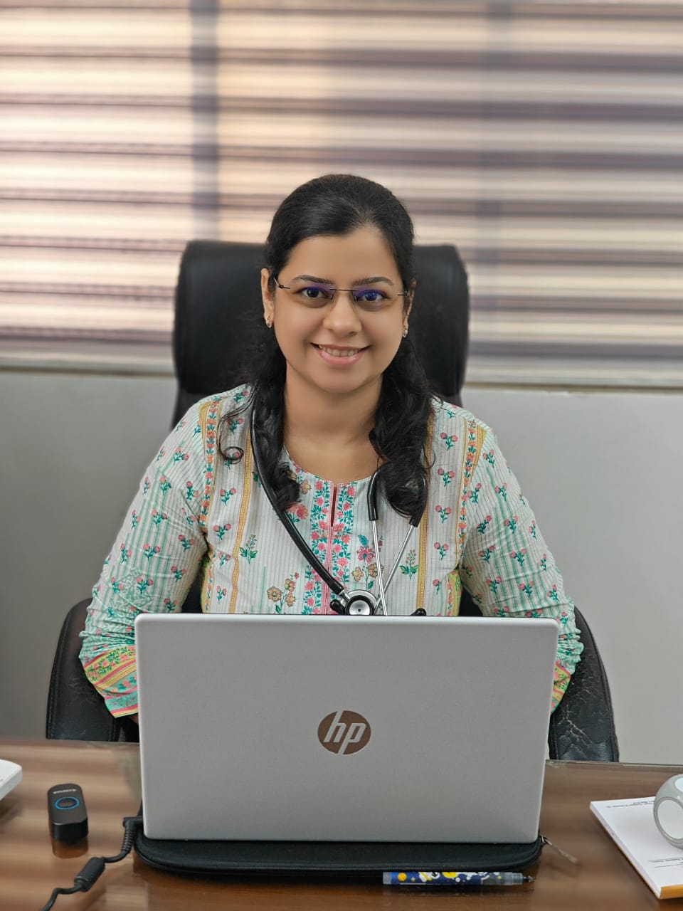 A professional portrait of Dr. Gauri Daptardar, a specialist at Sanjeevanee Homeocare.